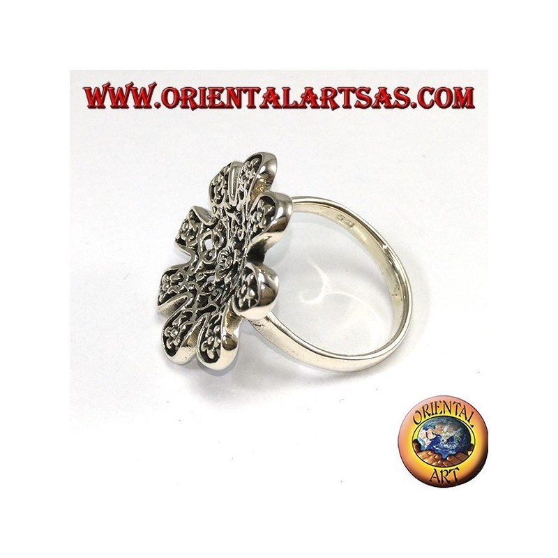 Silver ring in the shape of a flower with pierced roses