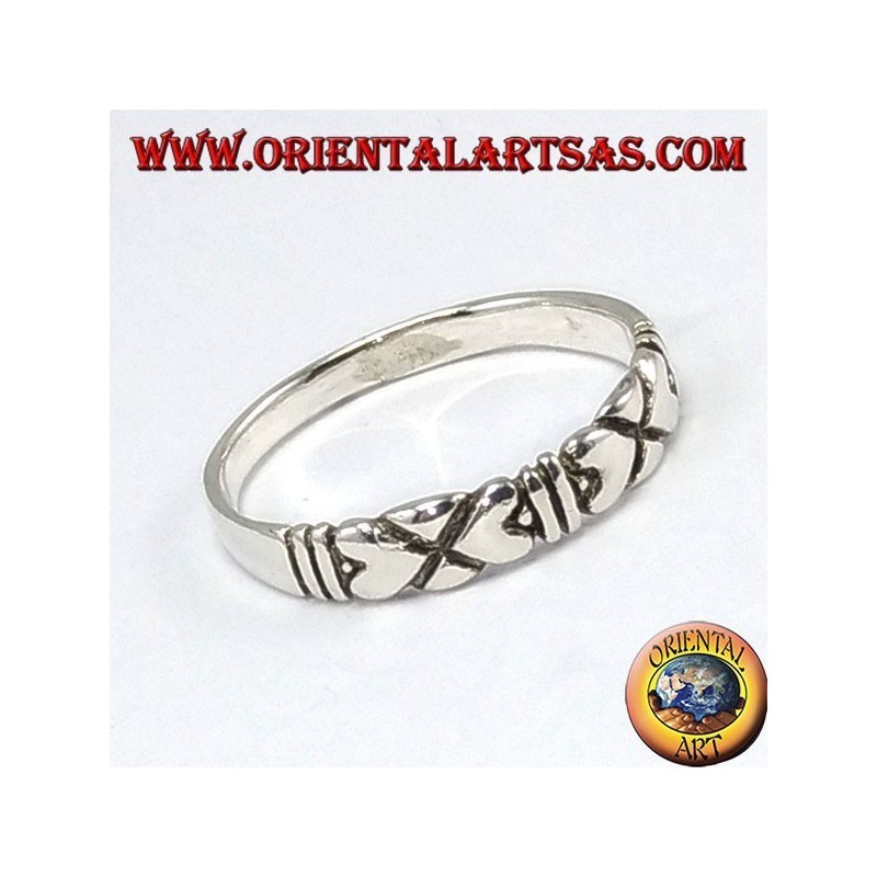 Silver ring, with opposing hearts