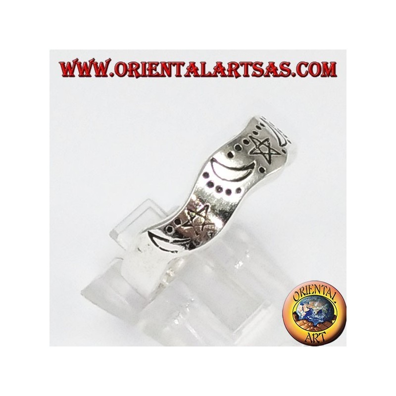 Corrugated silver ring with hand-carved star and moons
