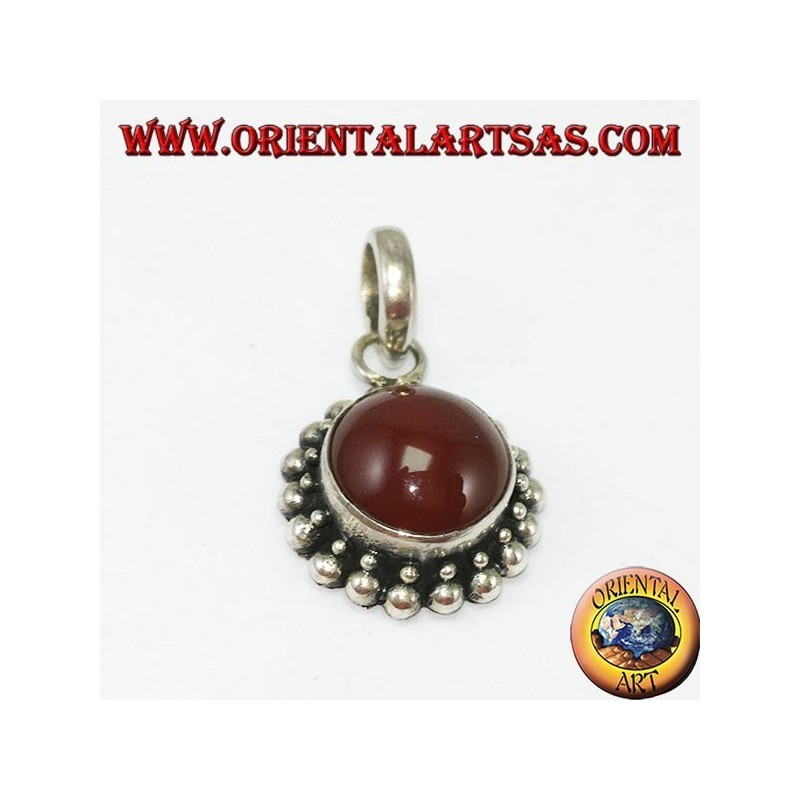 Silver pendant with round carnelian and border with two rounds of spheres