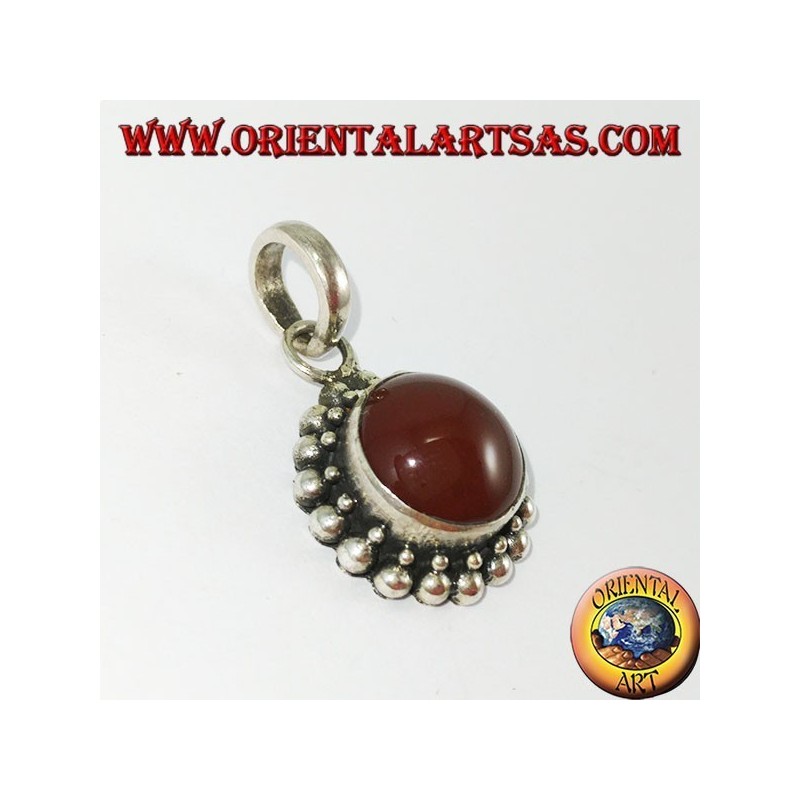 Silver pendant with round carnelian and border with two rounds of spheres