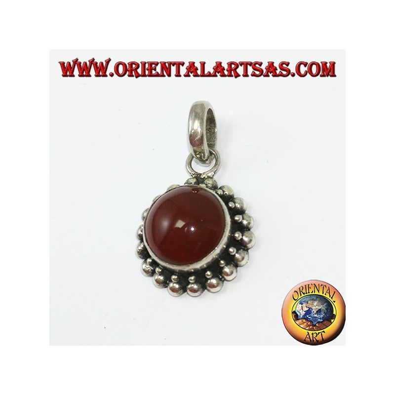 Silver pendant with round carnelian and border with two rounds of spheres
