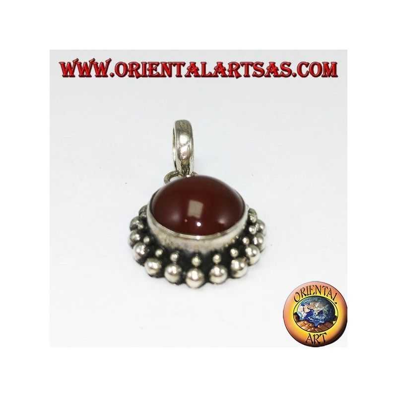 Silver pendant with round carnelian and border with two rounds of spheres