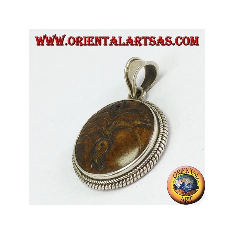 Pendant in silver Buddha eye carved in yack bone