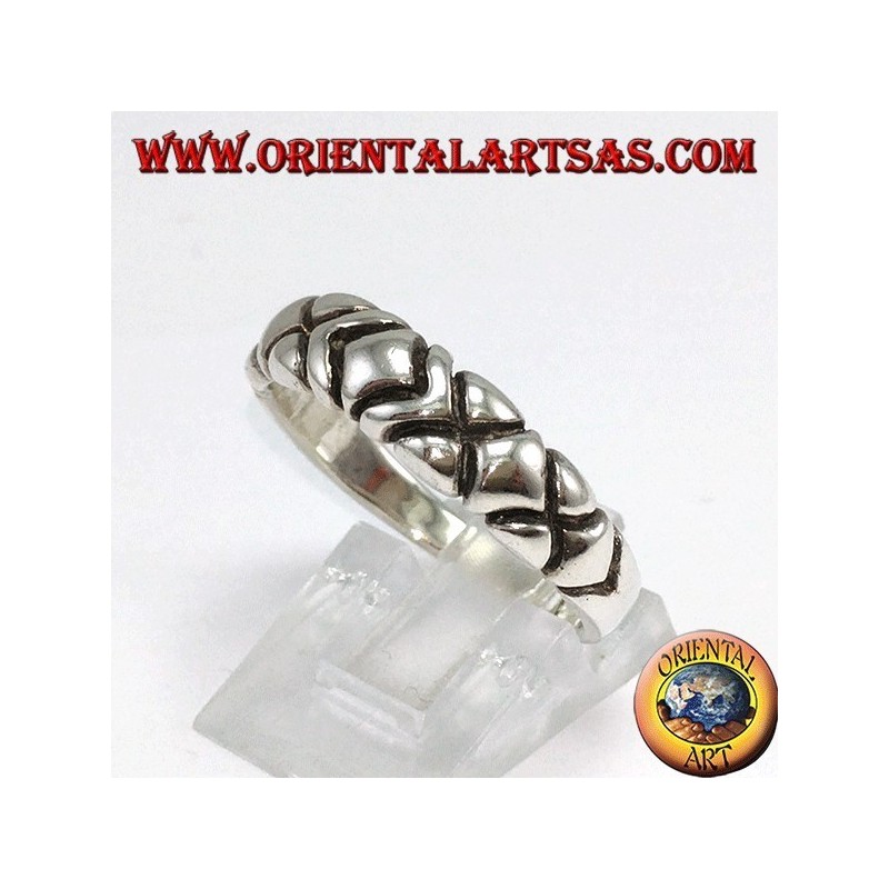 Anillo en plata, con cinco diamantes tallados