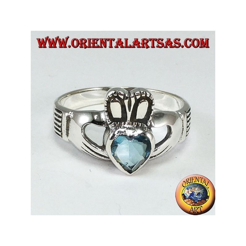 Anillo Claddagh con topacio azul