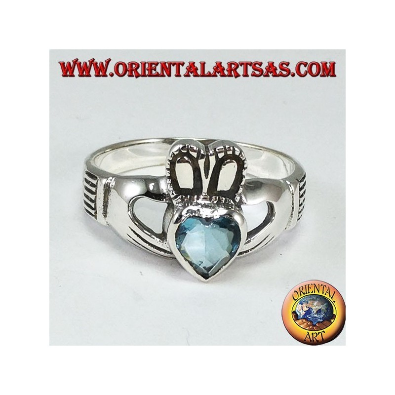 Bague Claddagh avec topaze bleue