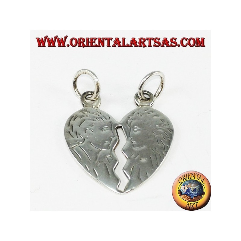 Pendant in silver heart that splits his head and her incised