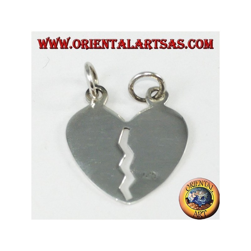 Pendant in silver heart that splits his head and her incised