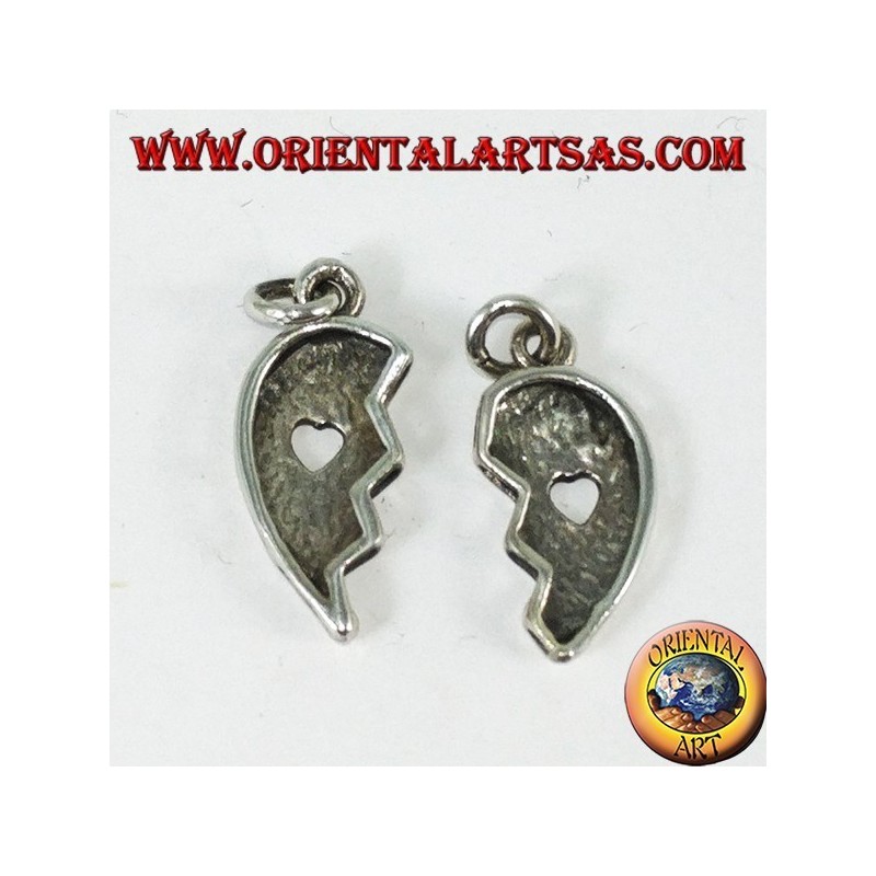 Silver pendant, heart divided with a heart inside