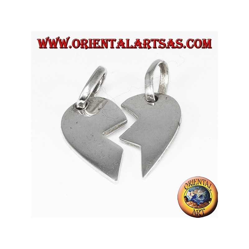 Silver pendant, heart divided into two