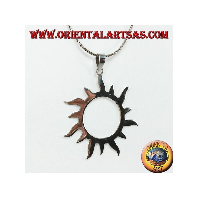 Silver pendant with sun rays