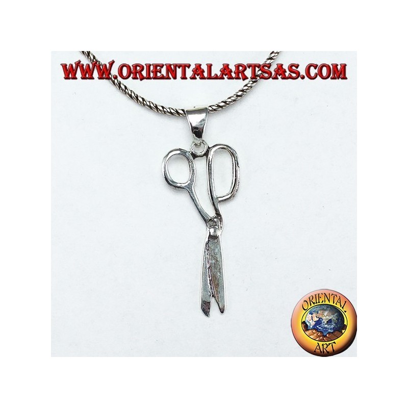 Silver pendant in the shape of scissors