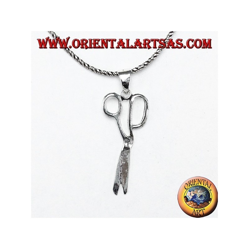 Silver pendant in the shape of scissors