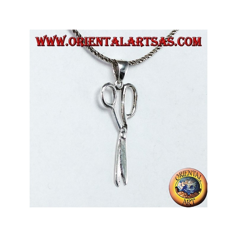 Silver pendant in the shape of scissors