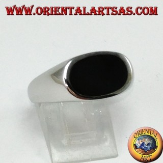 Silver ring with flat oval onyx mounted crosswise