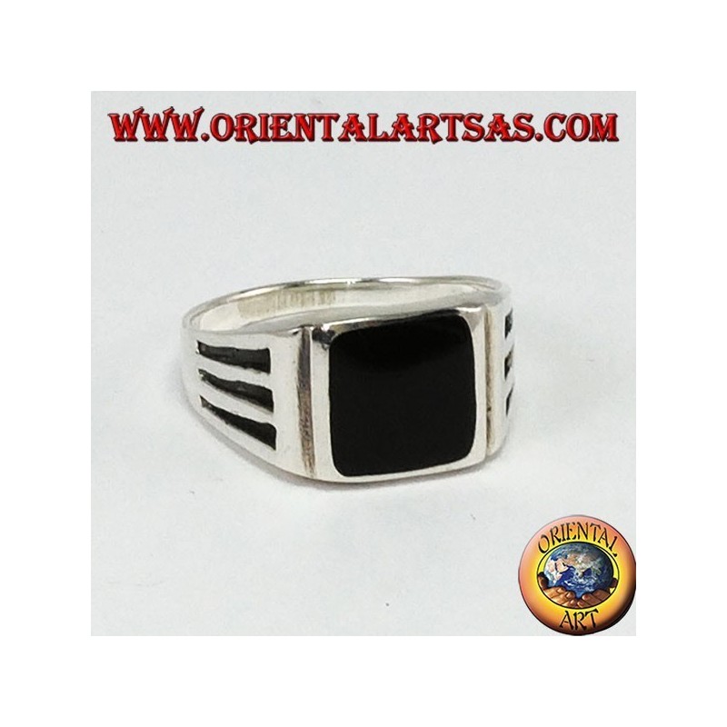 Silver ring with square onyx and engravings with three staves on the sides