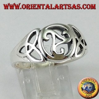 Silver ring with central triskell and two knots of tyrone