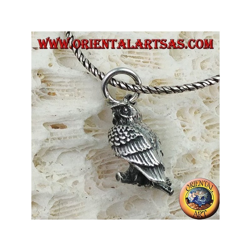 Pendant in silver owl on the three-dimensional branch