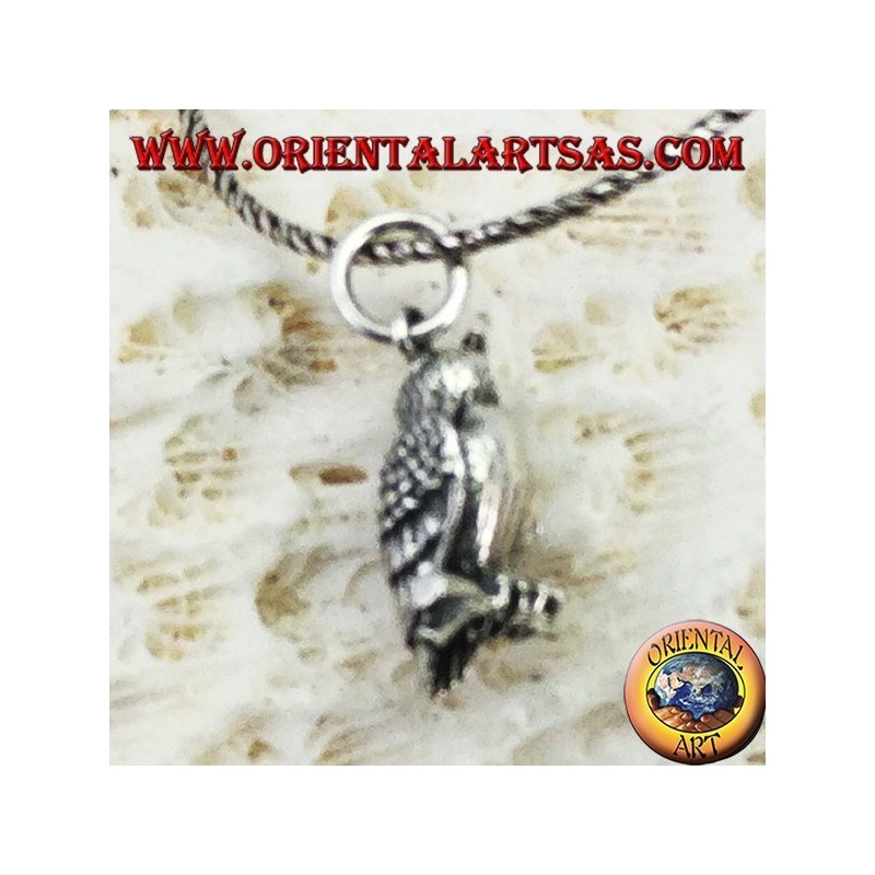 Pendant in silver owl on the three-dimensional branch