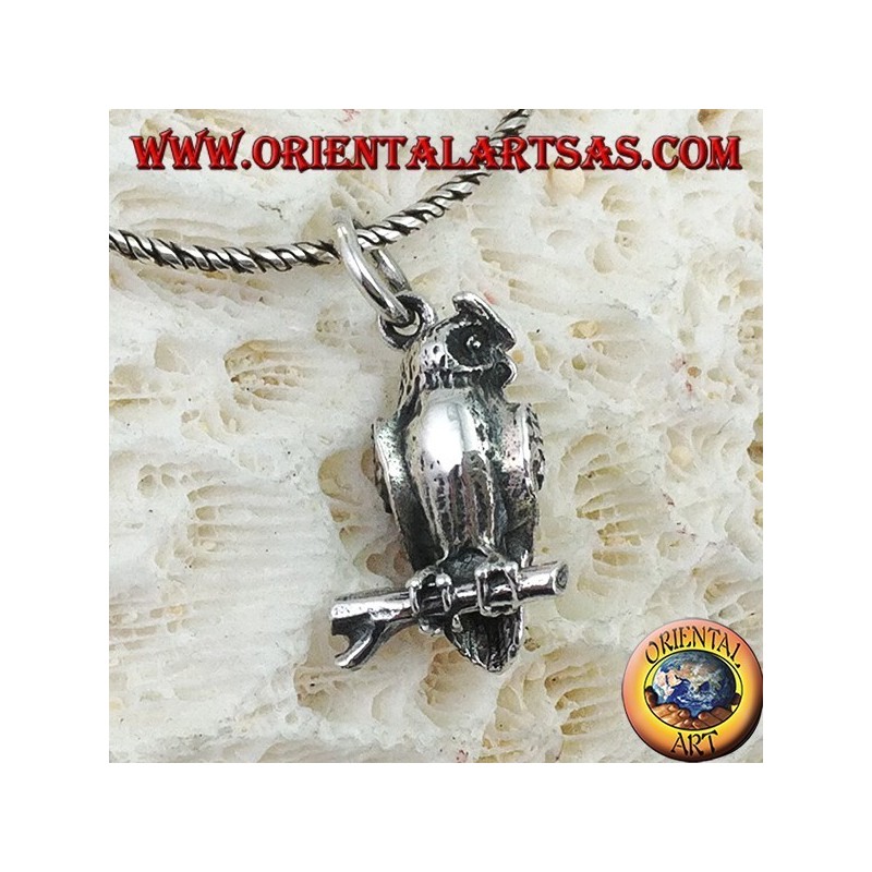 Pendant in silver owl on the three-dimensional branch