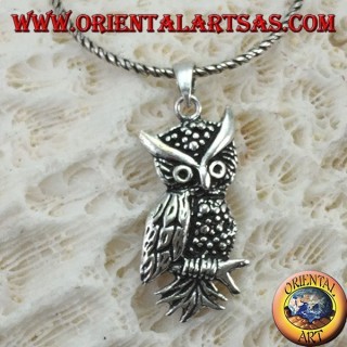 Owl-shaped pendant on the silver branch