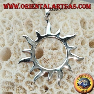 Silver pendant with sun rays