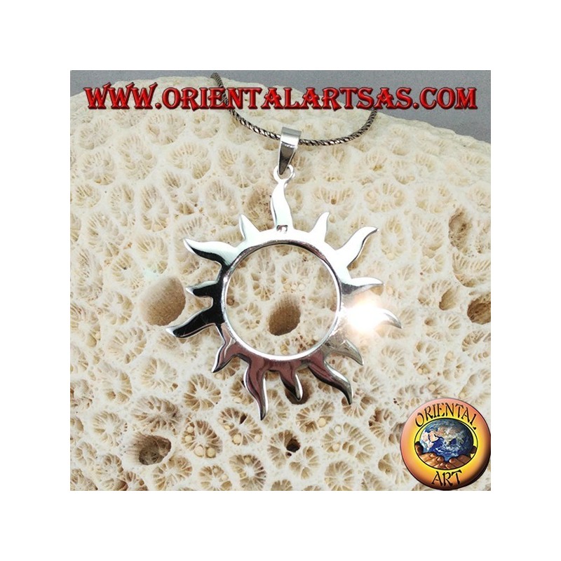 Silver pendant with sun rays