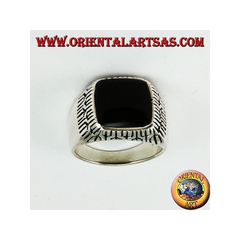 Silver ring with square onyx surrounded by engravings