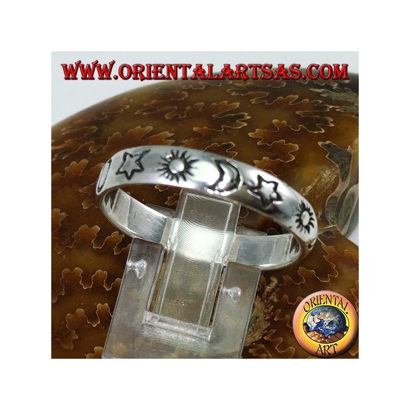 Silver ring engraved with sun and moon