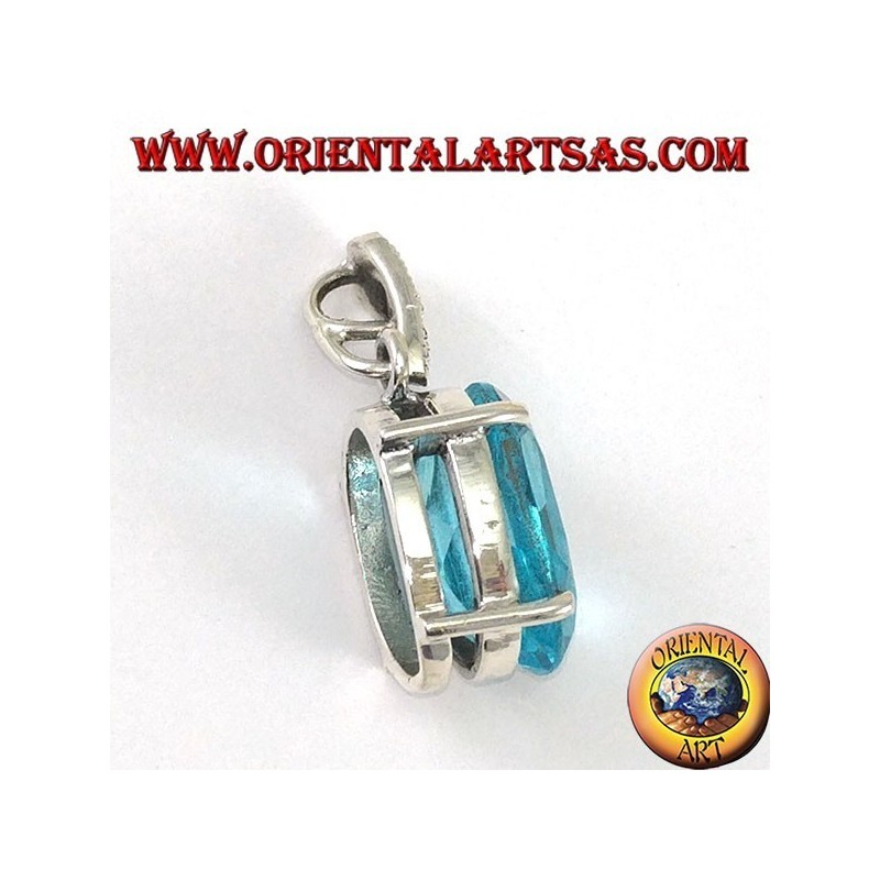 Silver pendant with oval blue Topaz set