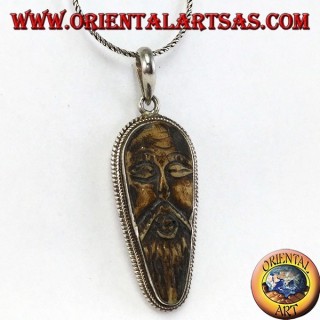 Silver pendant in old wise carved in yack bone