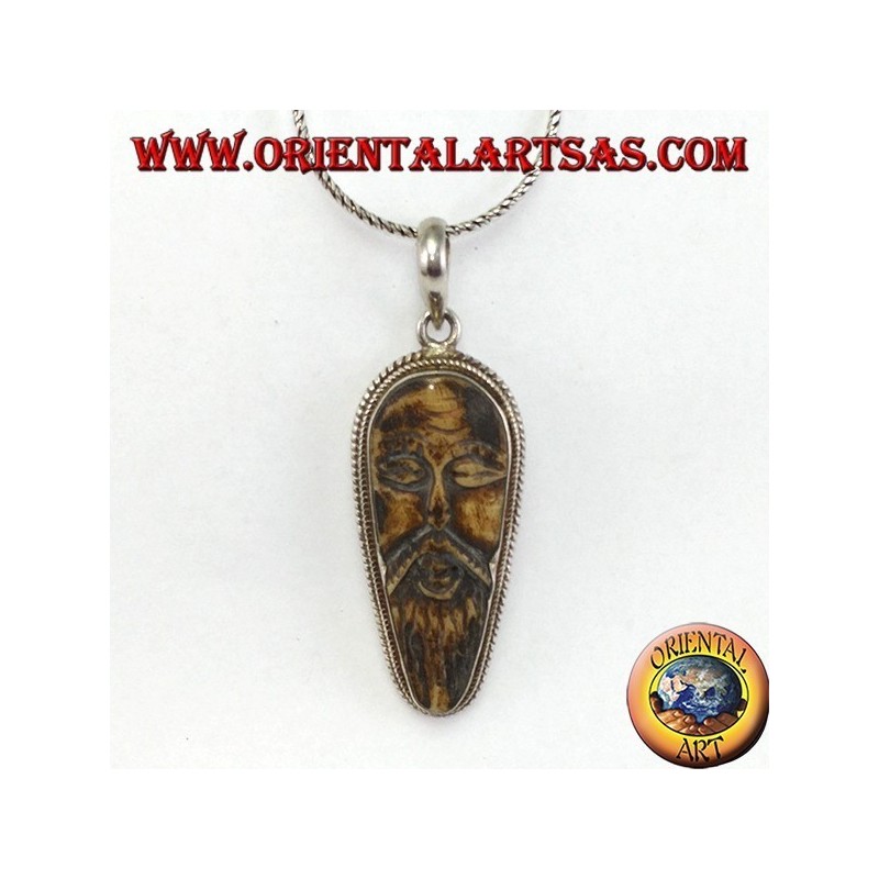 Silver pendant in old wise carved in yack bone