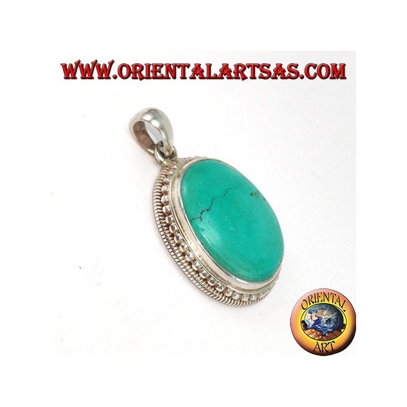 Colgante de plata con turquesa tibetana natural rodeado de bolas