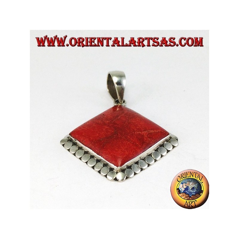 Silver pendant with square red madrepora surrounded by studs