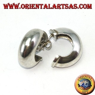 Wide silver hoop earrings with a butterfly clasp