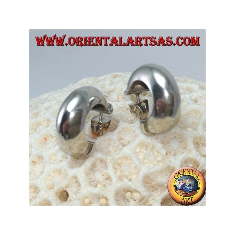 Wide silver hoop earrings with a butterfly clasp