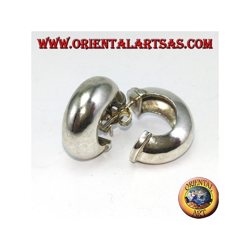 Wide silver hoop earrings with a butterfly clasp