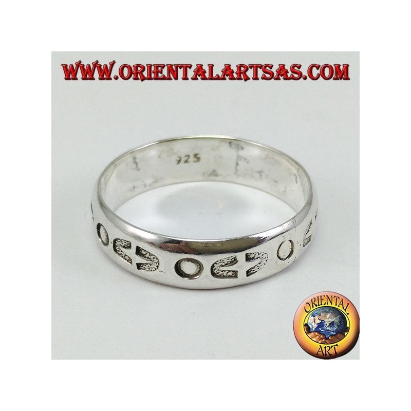 Anillo en banda de plata incrustada a mano