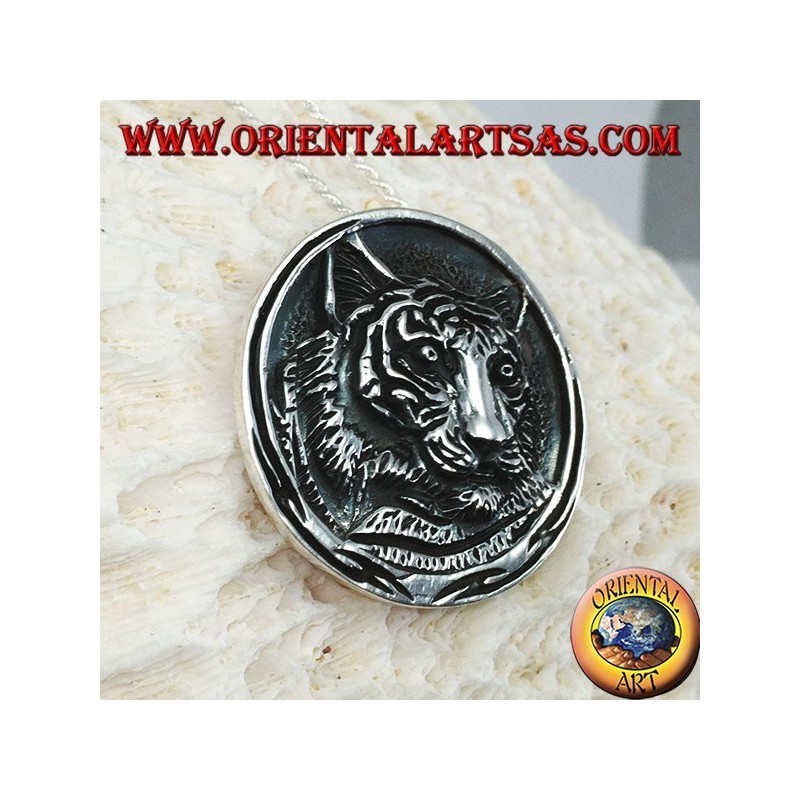 Silver pendant, medallion tiger head