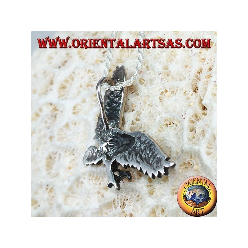 Colgante de plata, águila dorada
