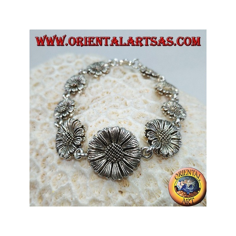 Pulsera de plata en forma de margaritas