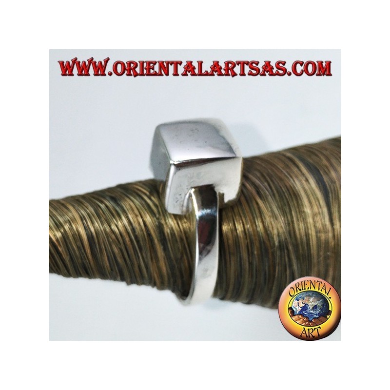 Silver ring in smooth cube