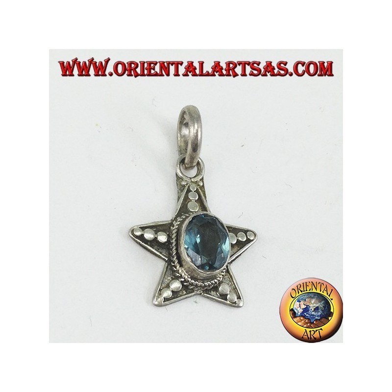 Silver star pendant with oval blue Topaz