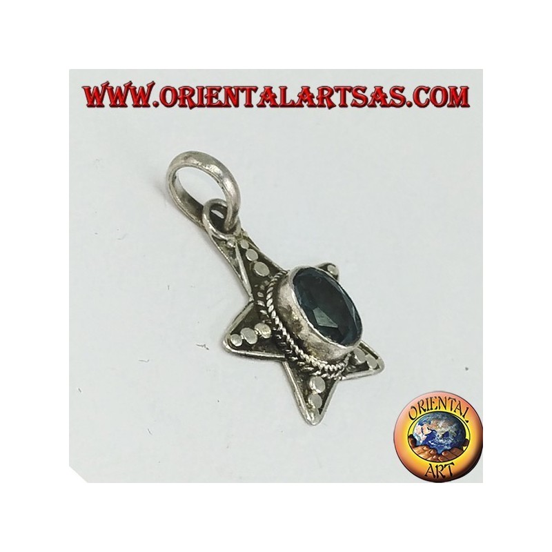 Silver star pendant with oval blue Topaz