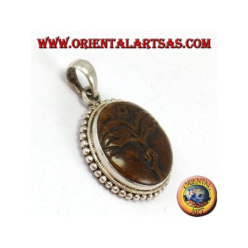 Ciondolo in argento amuleto occhio di Buddha intagliato in osso di yack