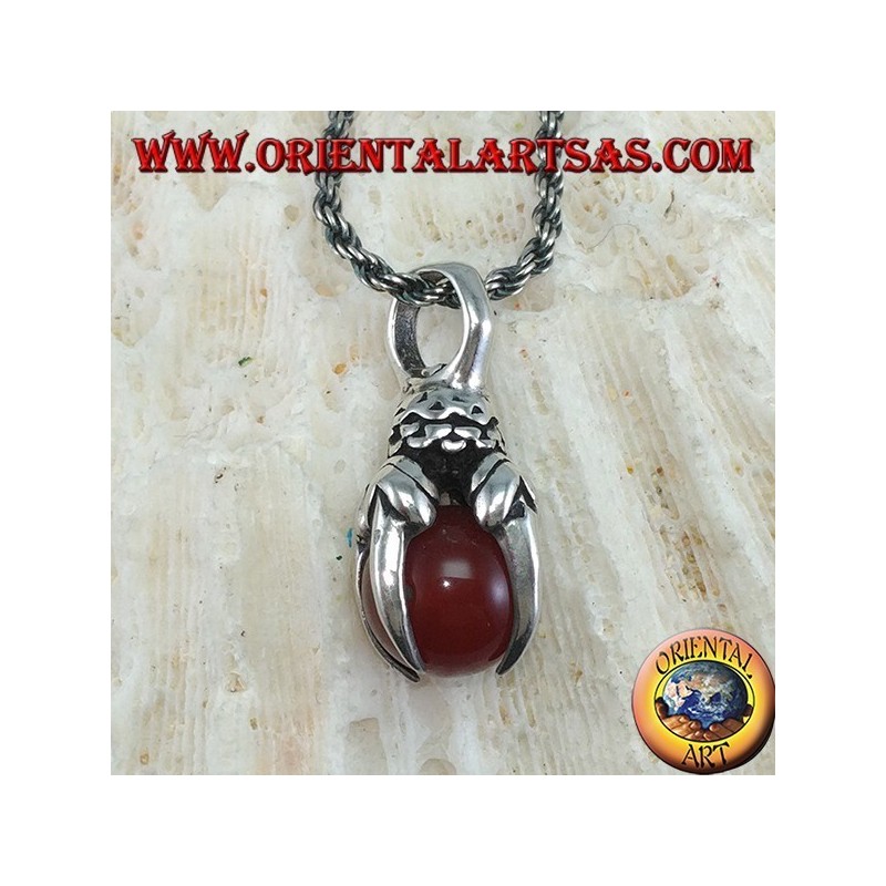 Pendant in silver eagle claw with carnelian sphere