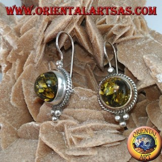Silver earring with green hemisphere amber