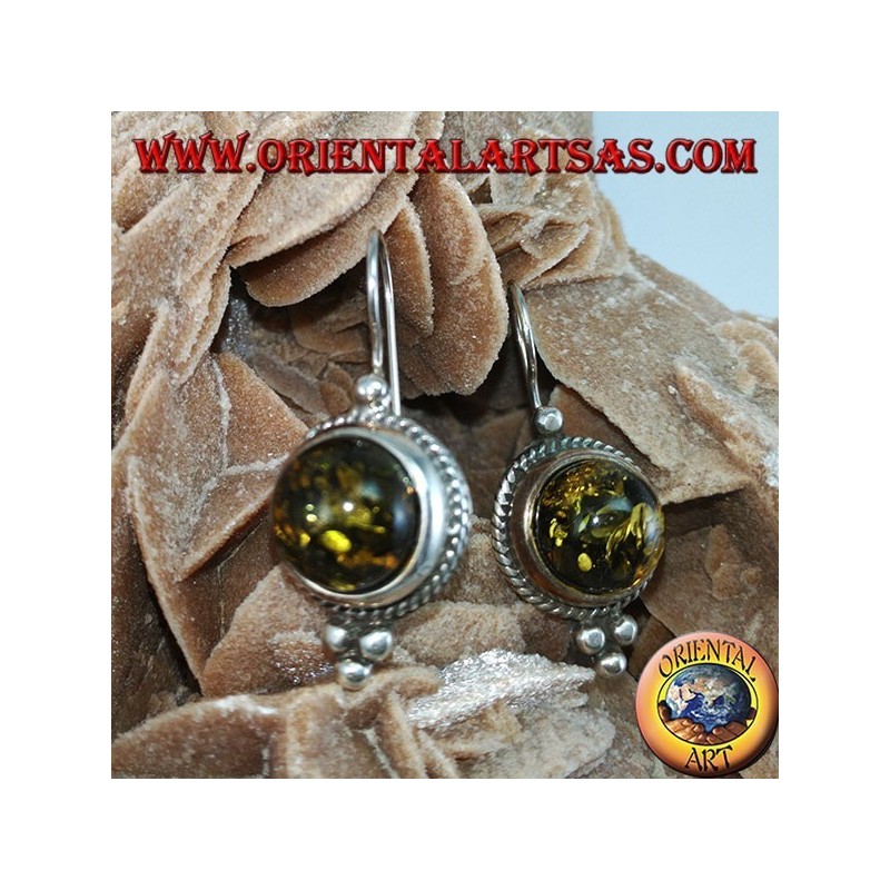 Silver earring with green hemisphere amber