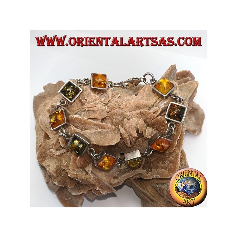 Silver bracelets with alternating green and yellow square amber